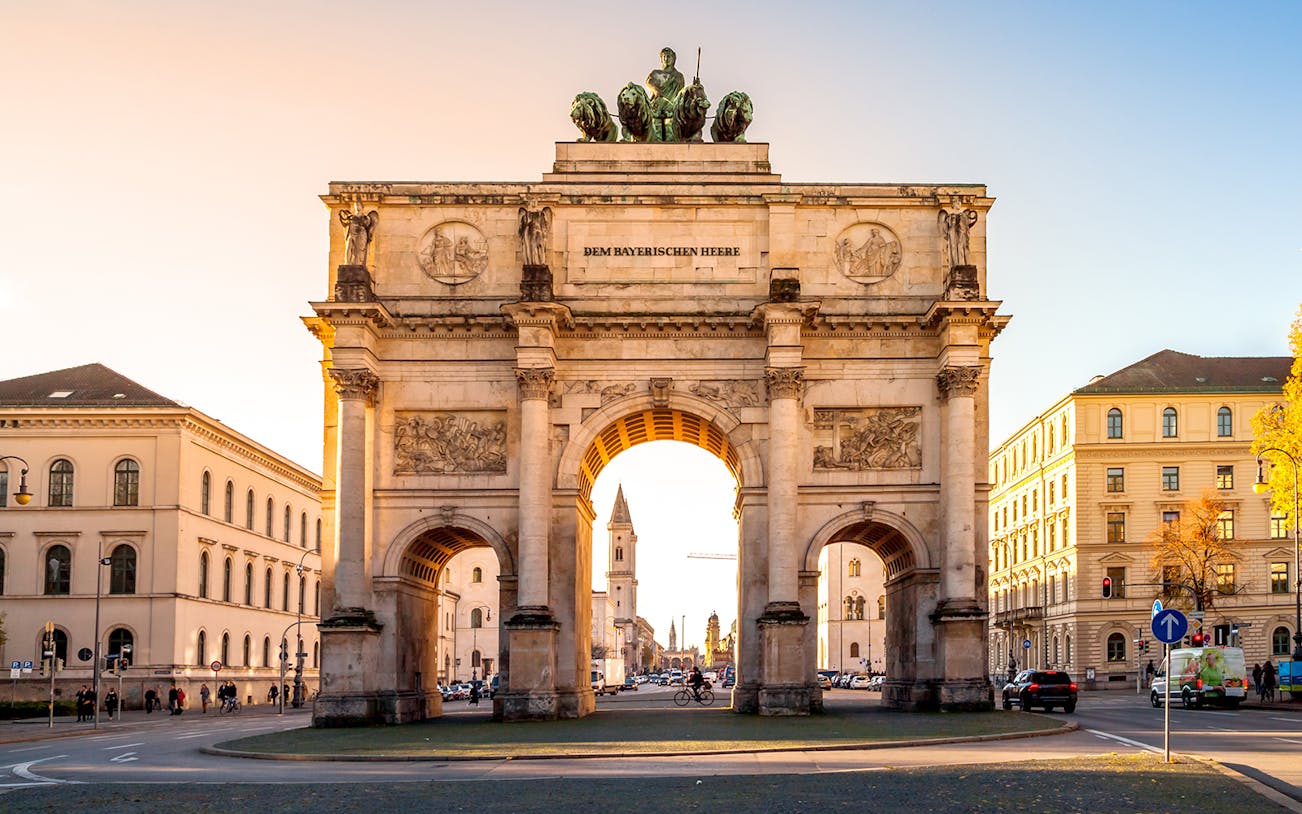 Triumphal arch Siegestor in Munich during a guided tour.