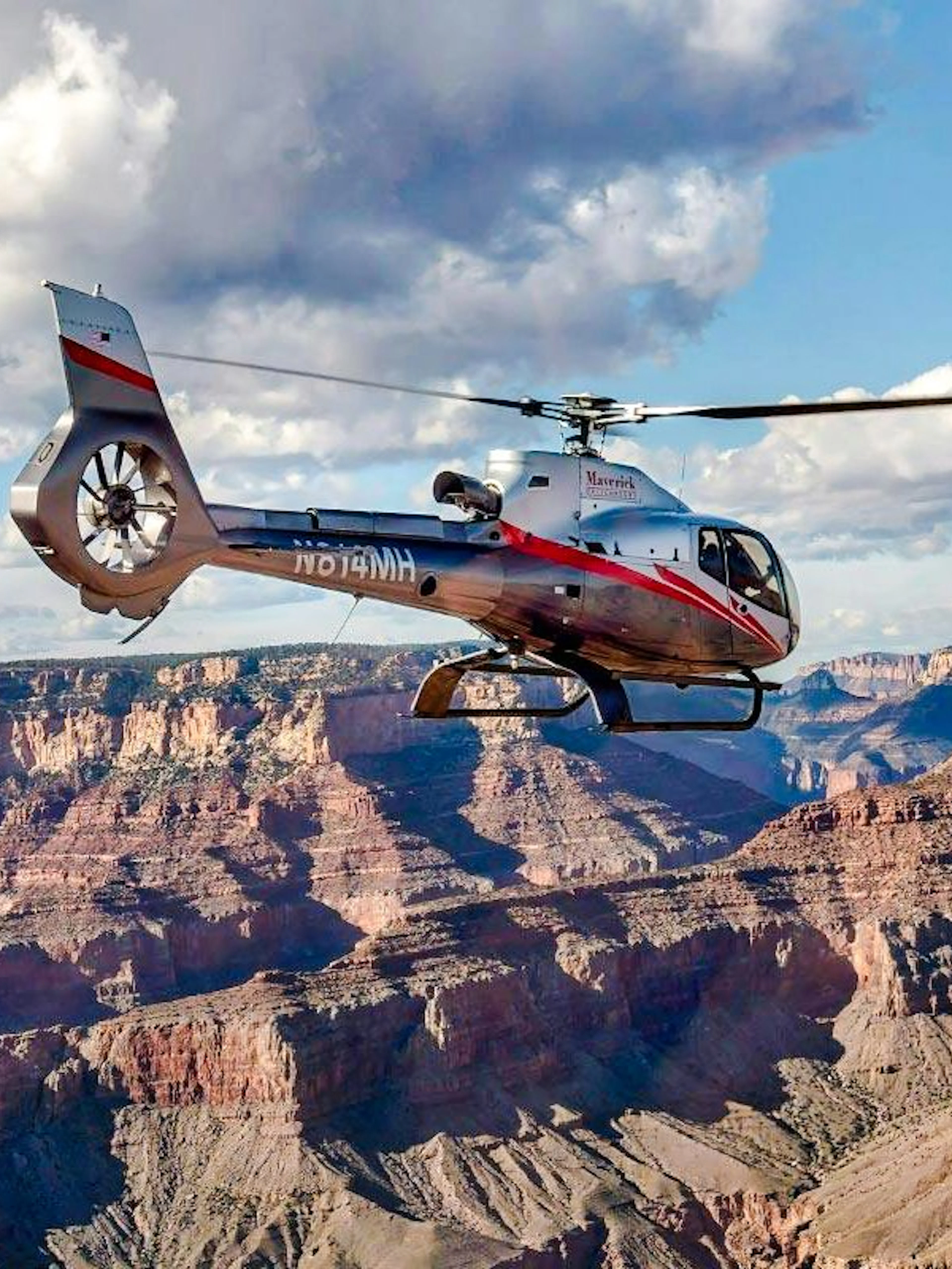 Helicopter flying over Grand Canyon South Rim.