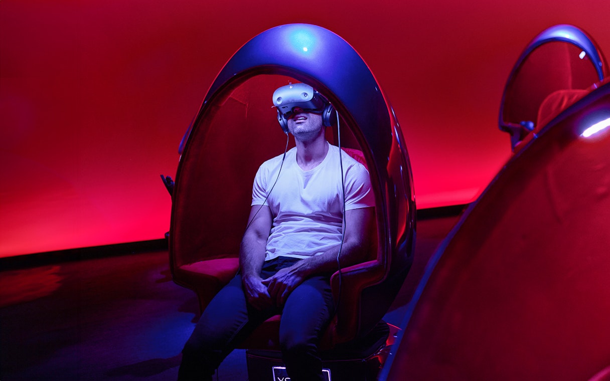 Person experiencing virtual reality at Melbourne Skydeck Max VR Experience.