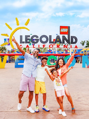 Family enjoying entrance at Legoland California.