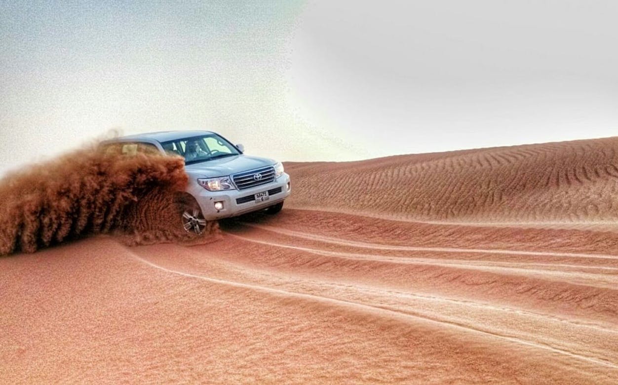 safari nel deserto a ras al khaimah con accesso all'oasi beduina, dune bashing, giro in cammello e cena barbecue-2