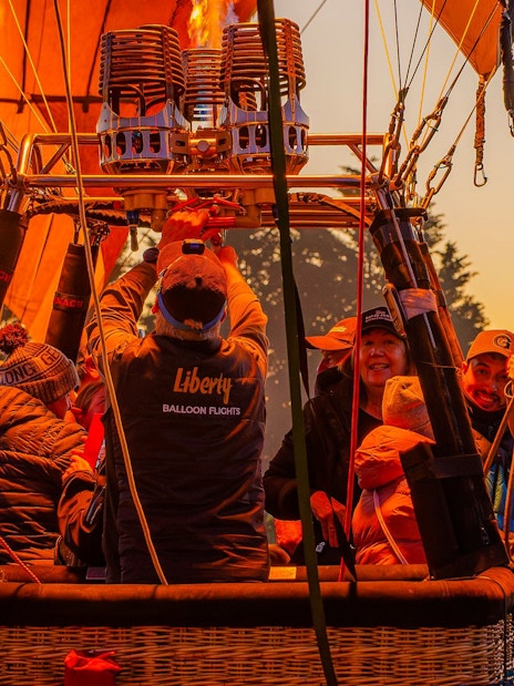 Liberty Balloon Flights crew preparing hot air balloon for ride, Geelong, Australia.