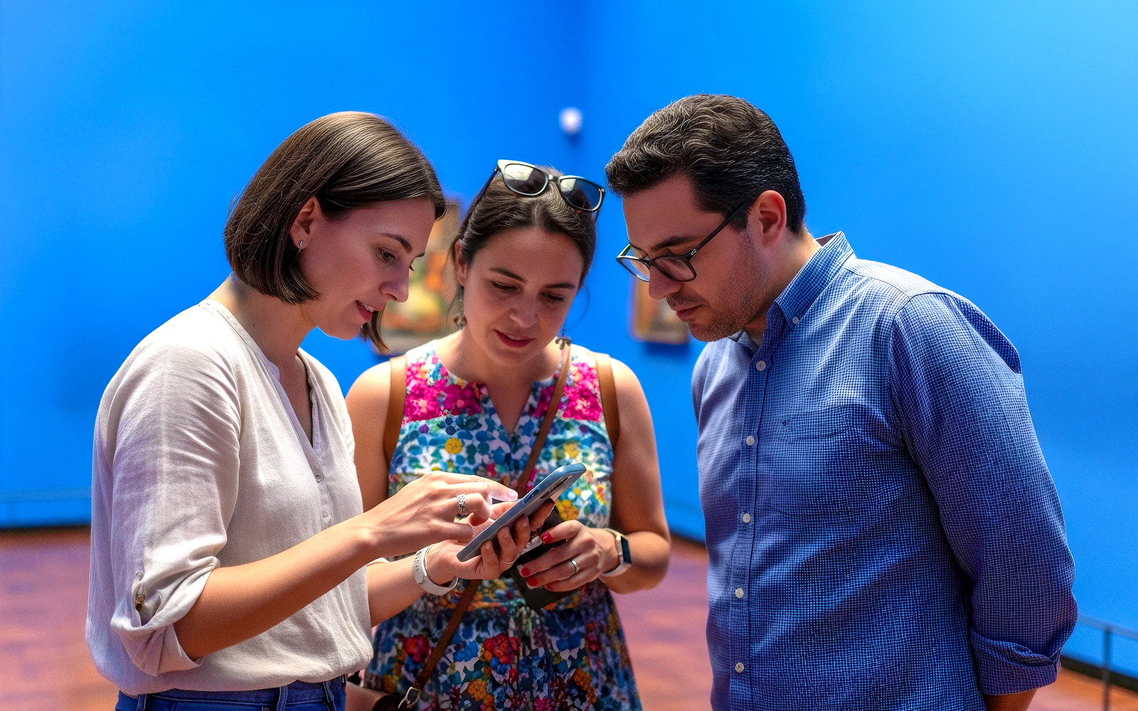 Visitors using audio guide inside Frida Kahlo Museum, Mexico City.