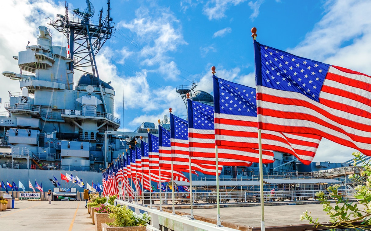 American flags line the path at Missouri Warship Memorial.