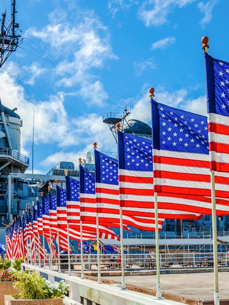 American flags line the path at Missouri Warship Memorial.