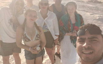 Group enjoying Black and White Desert safari near Cairo.