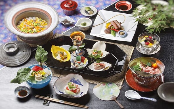 Traditional Japanese kaiseki meal at Hokkaido Nadaman Sapporo saryo branch, featuring assorted dishes.