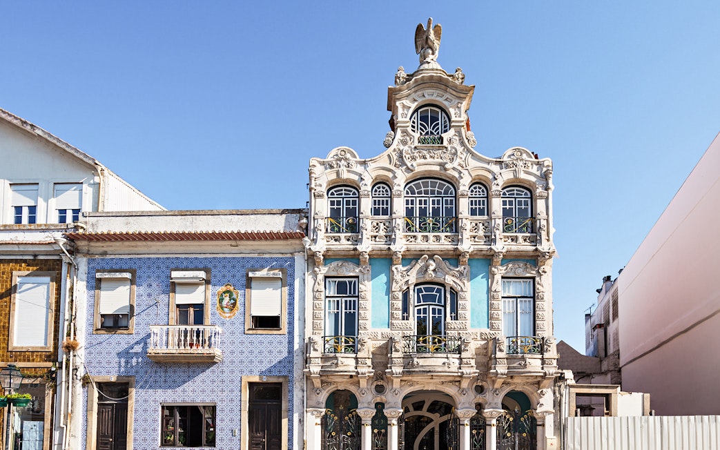 Aveiro's Art Nouveau architecture on a guided tour with Moliceiro cruise.