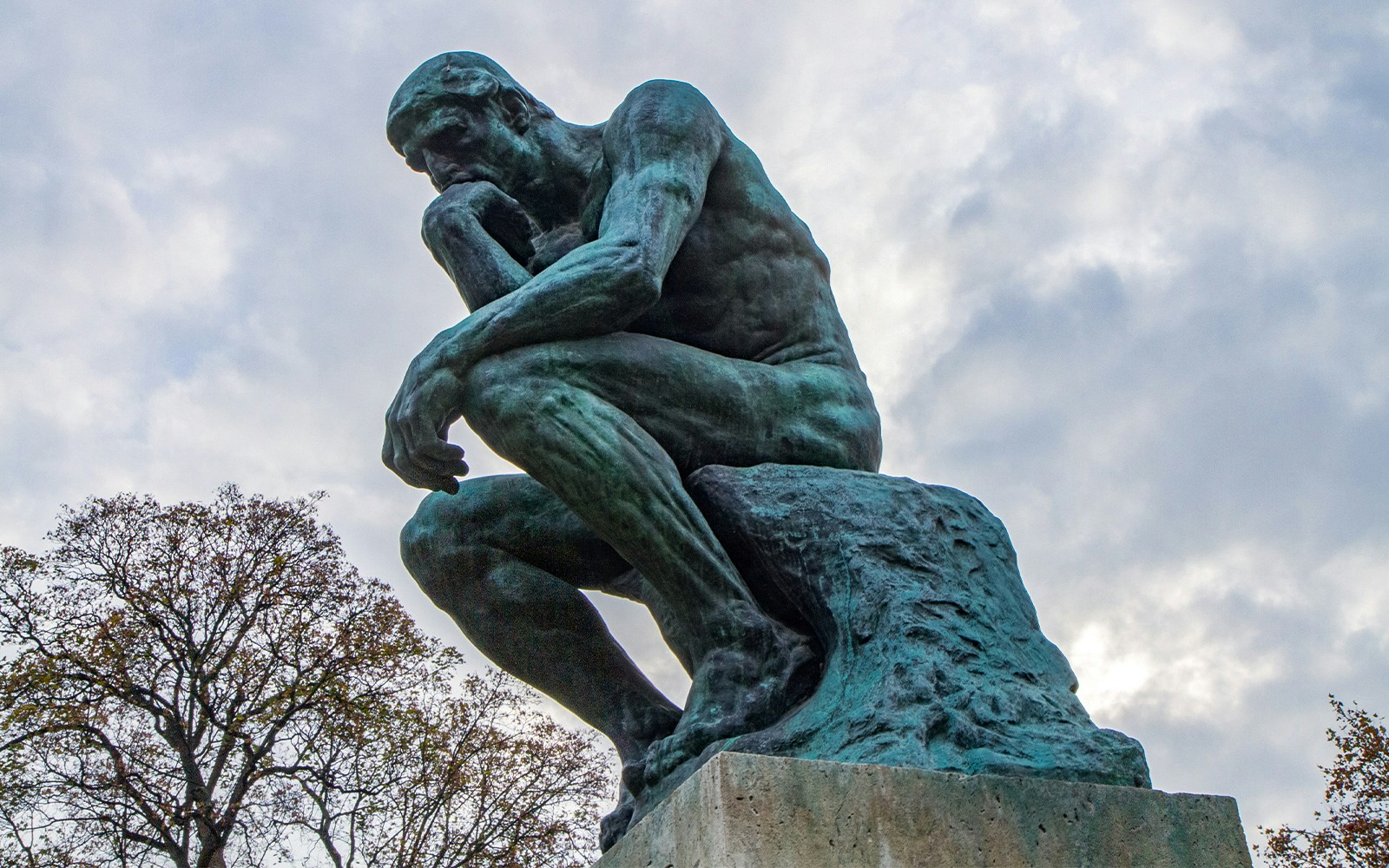 The Thinker sculpture by Rodin at the Rodin Museum, Paris.