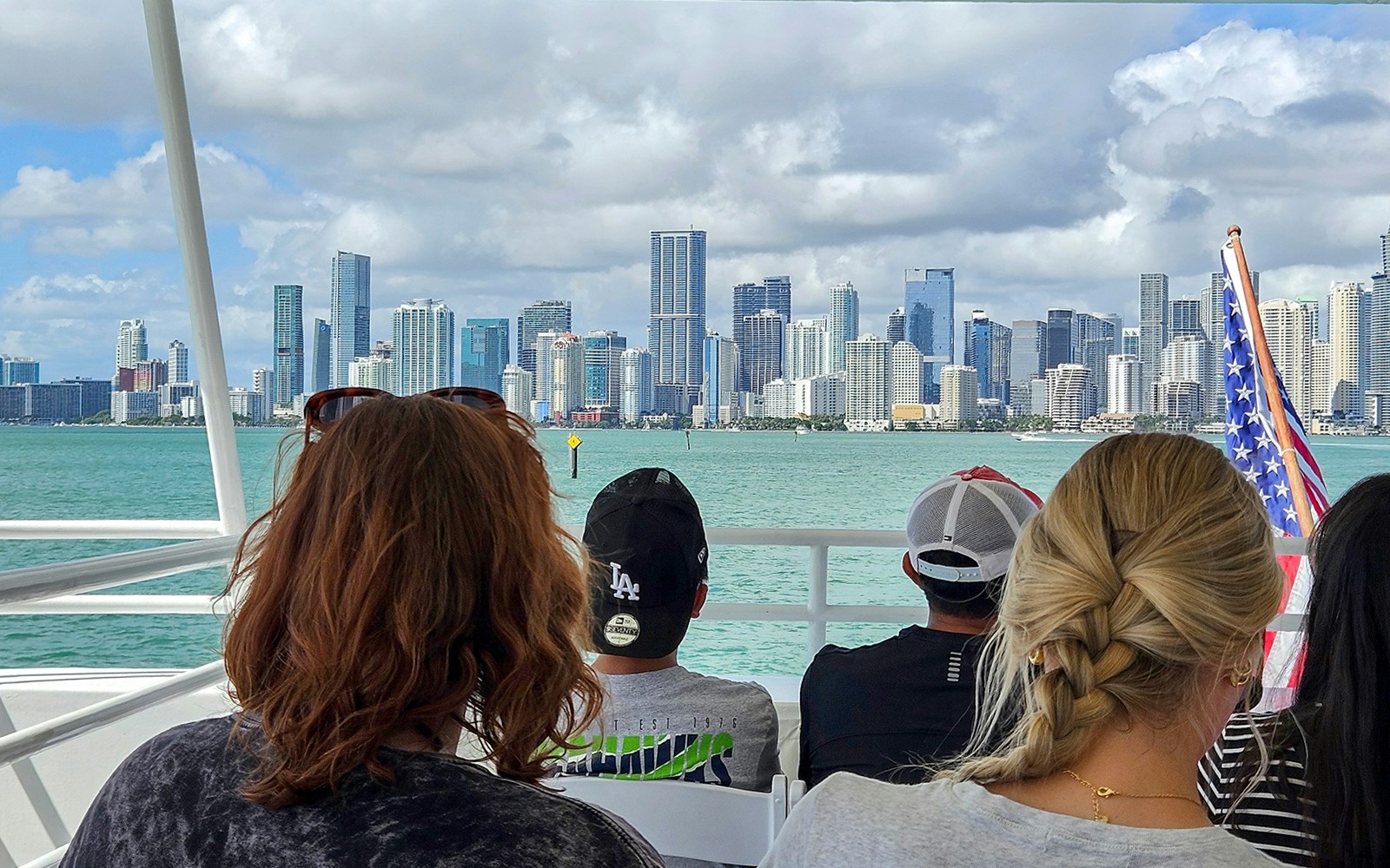 Miami skyline view from luxury yacht on Millionaire's Homes cruise, South Beach, Venetian Island.