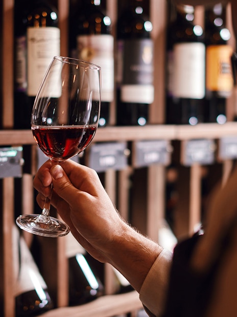 Wine tasting in a Roman cellar during a Food & Wine Tour in Rome.
