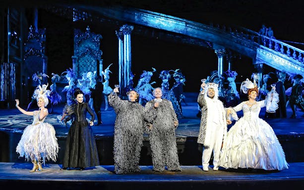 Performers in elaborate costumes during The Phantom of the Opera on Sydney Harbour.