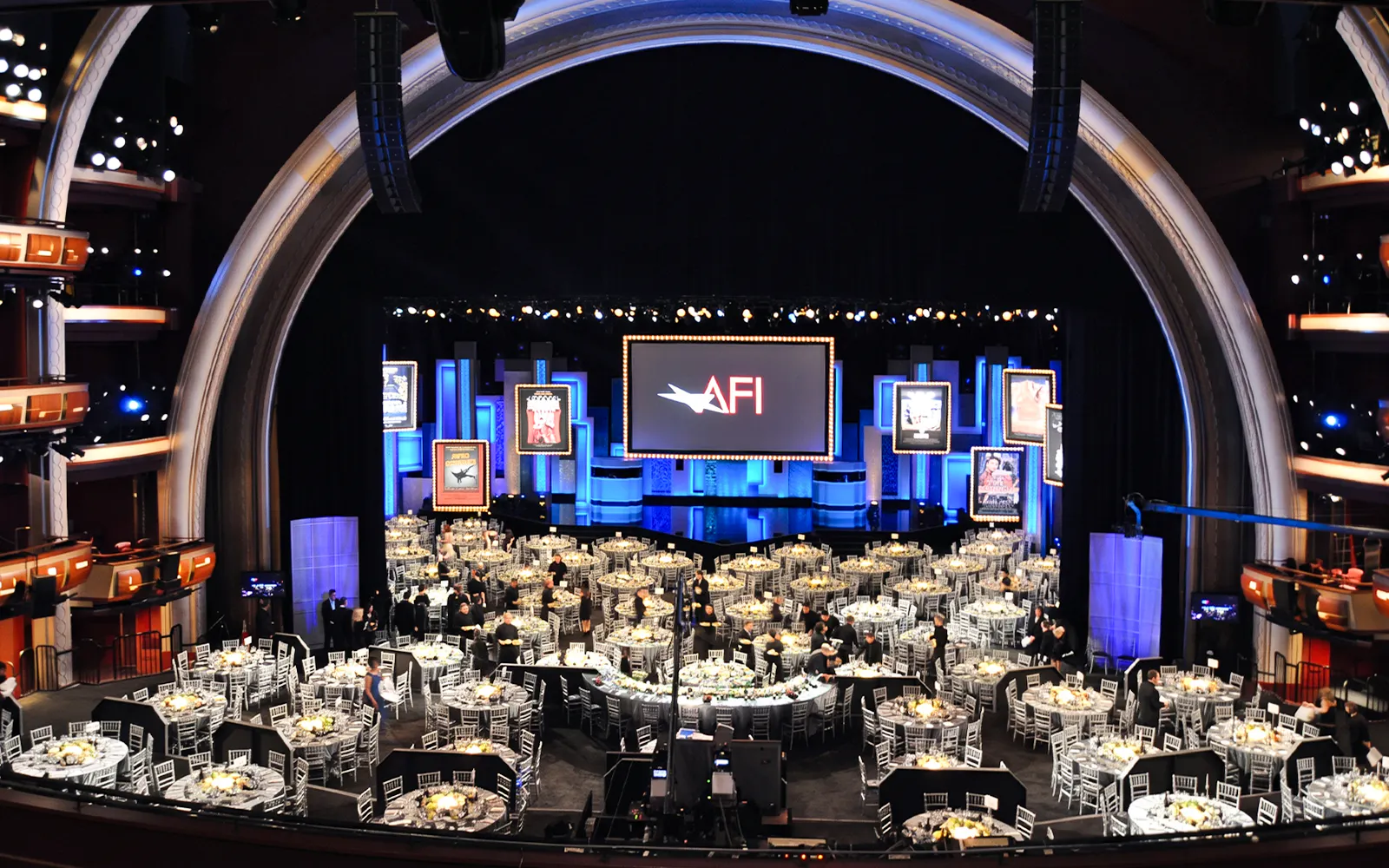 Dolby Theatre interior set up for an event with tables and stage.