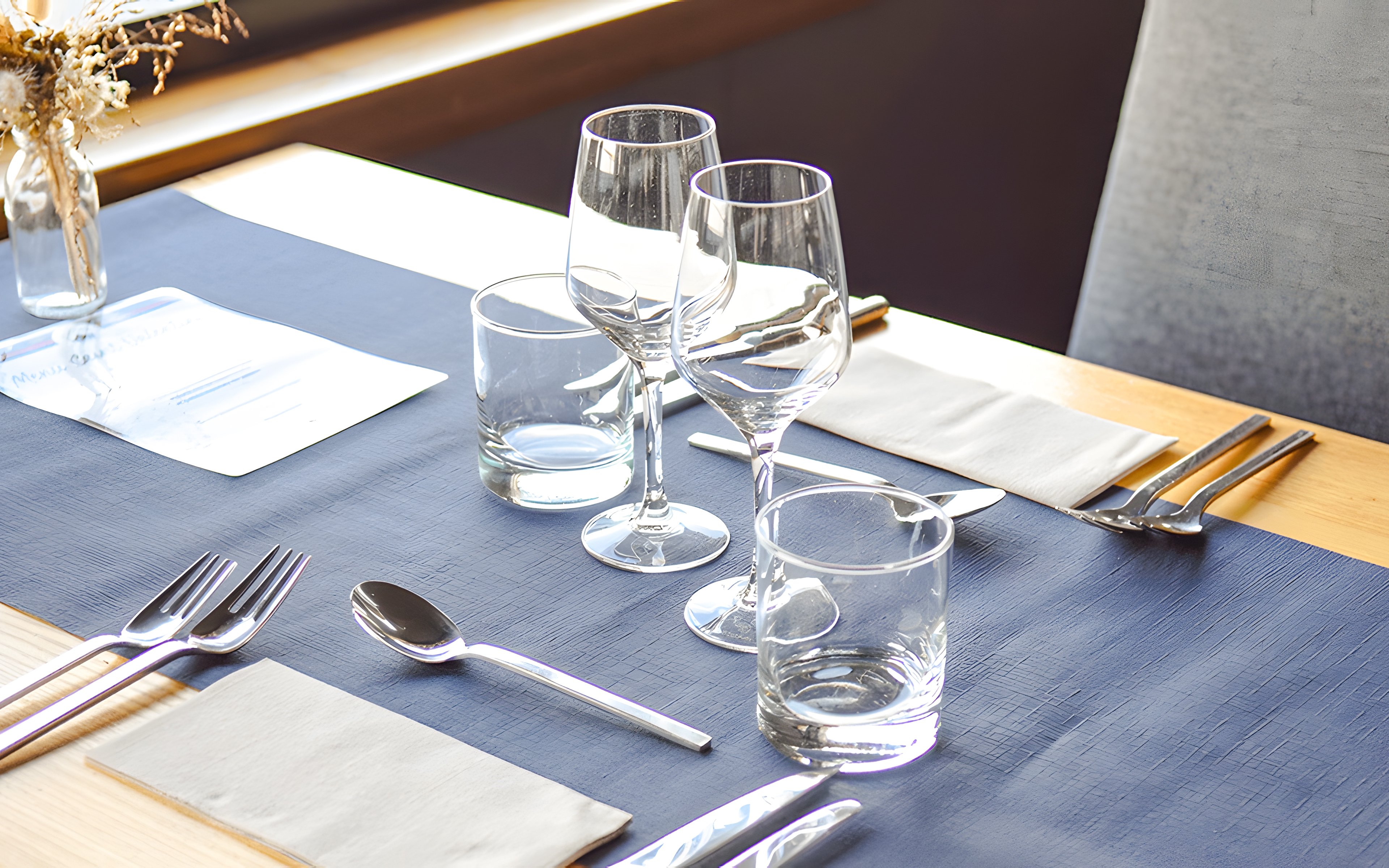 Elegant table setting on Bateaux Bordelais lunch cruise.