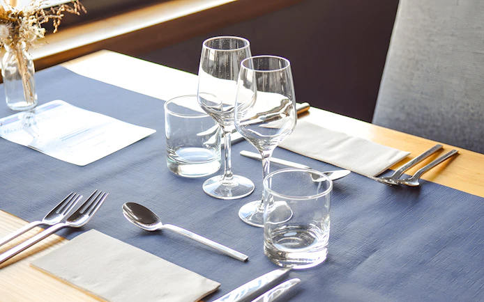 Elegant table setting on Bateaux Bordelais lunch cruise.