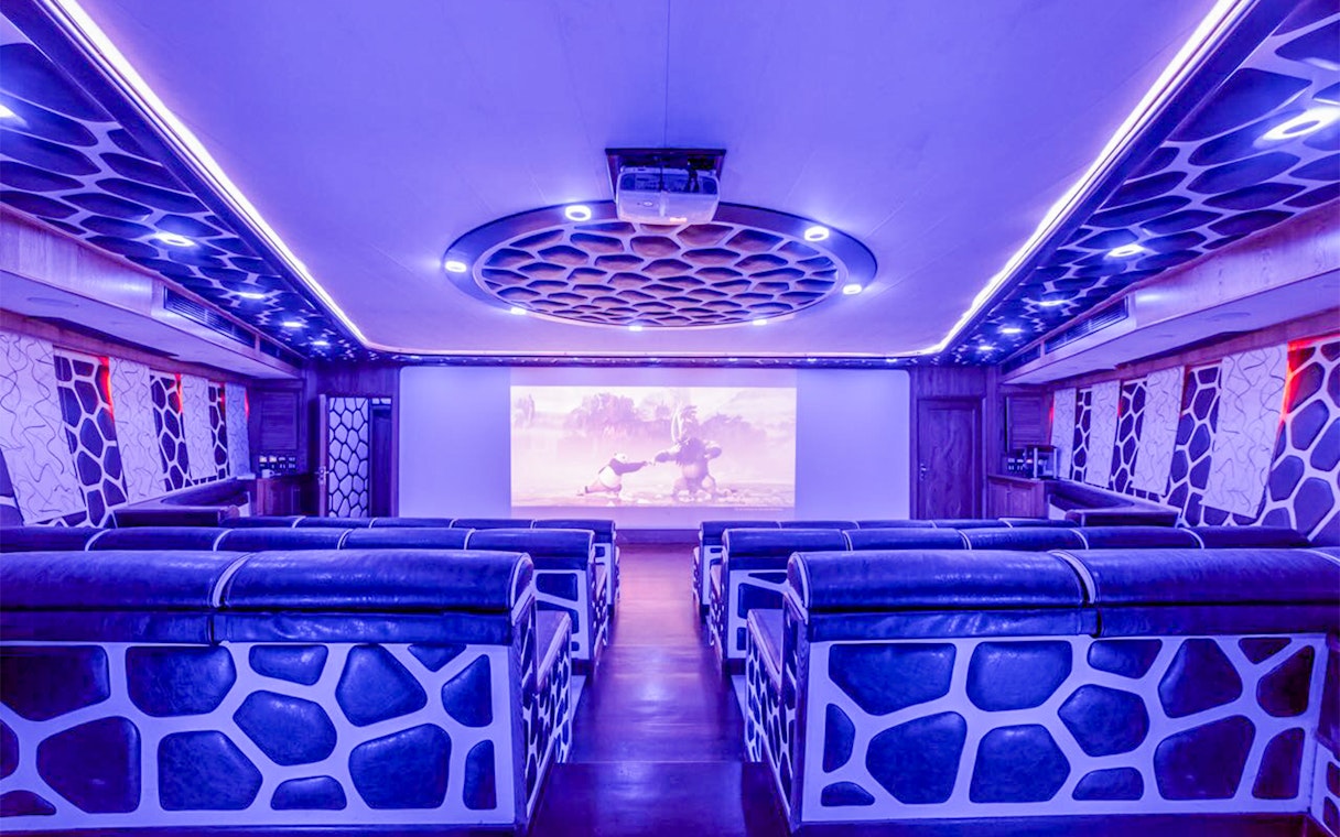 Luxury cinema room on a mega yacht dinner cruise in Dubai.