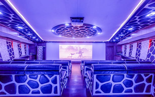 Luxury cinema room on a mega yacht dinner cruise in Dubai.