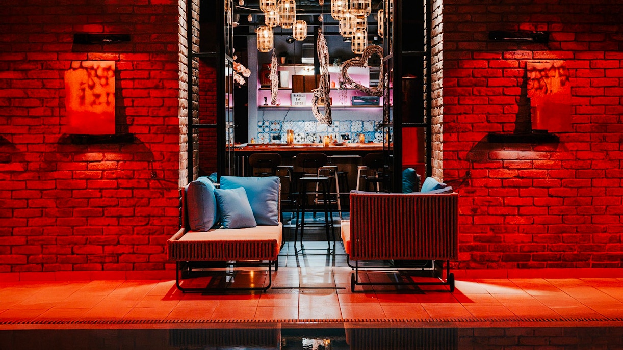 Mandala Day Spa lounge area with seating and ambient lighting.