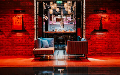 Mandala Day Spa lounge area with seating and ambient lighting.
