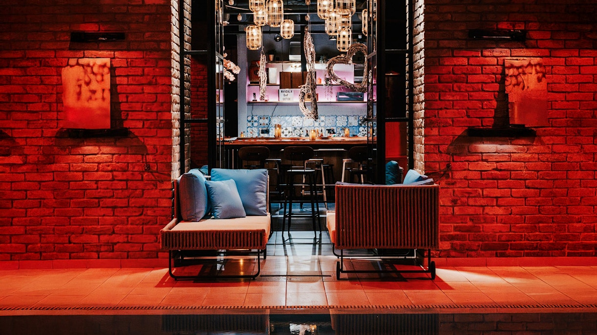 Mandala Day Spa lounge area with seating and ambient lighting.