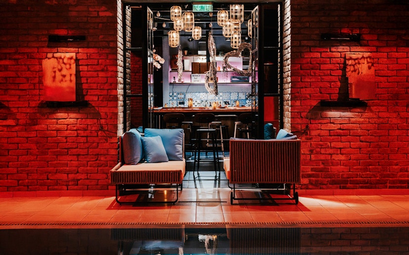 Mandala Day Spa lounge area with seating and ambient lighting.