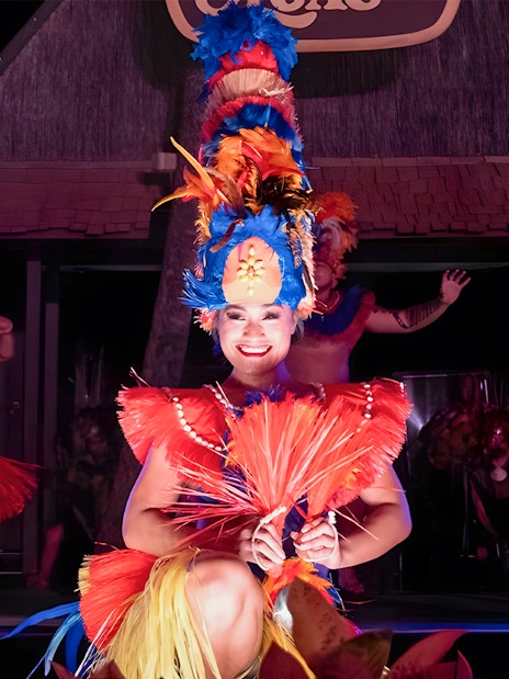 Dancers in traditional attire performing at Germaine's Luau.