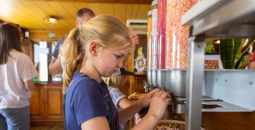 Guests enjoying a scenic view of Rotterdam's skyline aboard the Pancake Cruise.