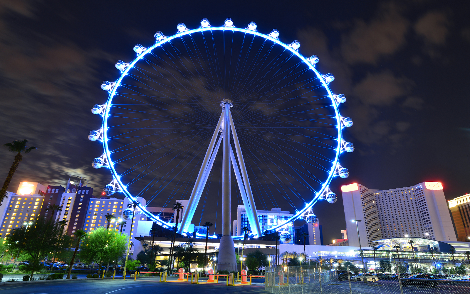 High Roller Observation Wheel illuminated at night in Las Vegas, offering panoramic city views.