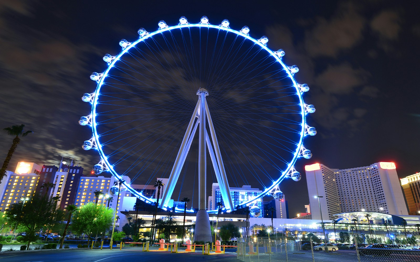 High Roller Observation Wheel illuminated at night in Las Vegas, offering panoramic city views.