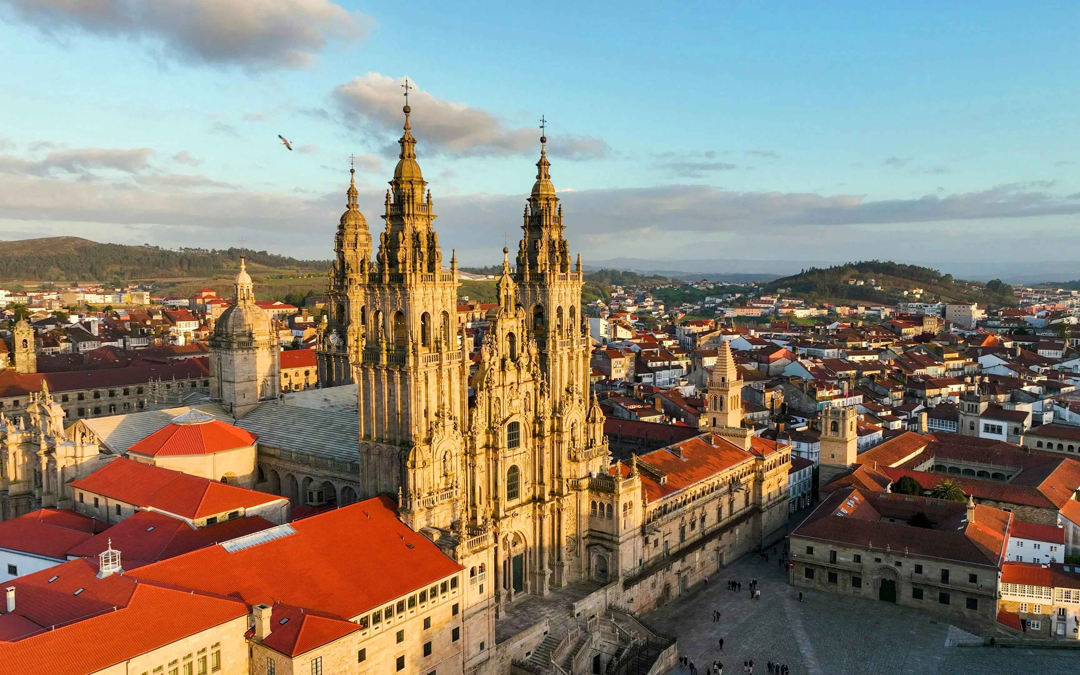 Aerial view of Santiago de Compostela Cathedral with surrounding cityscape.