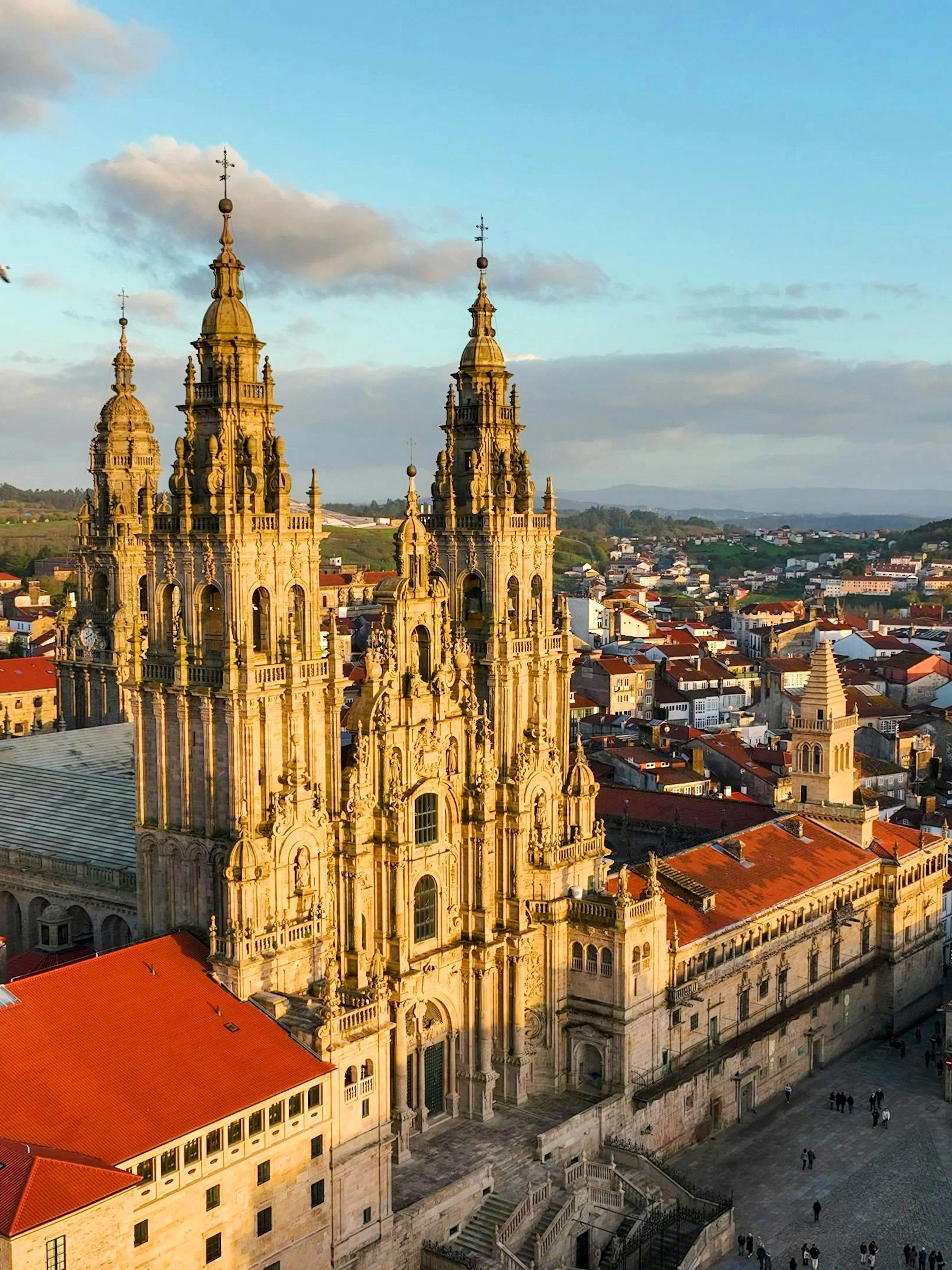 Aerial view of Santiago de Compostela Cathedral with surrounding cityscape.