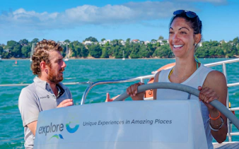 Sailing cruise on Waitematā Harbour, Auckland with smiling participants.