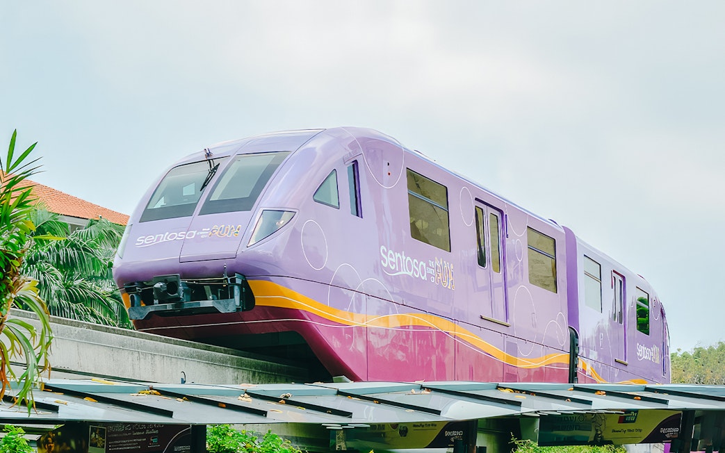Purple monorail on track, Sentosa Island, Singapore.