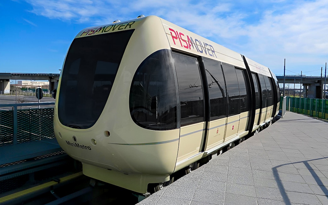 Pisamover Mini Metro at Pisa Airport platform for city transfer.