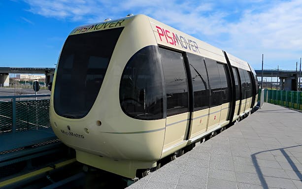 Pisamover Mini Metro at Pisa Airport platform for city transfer.