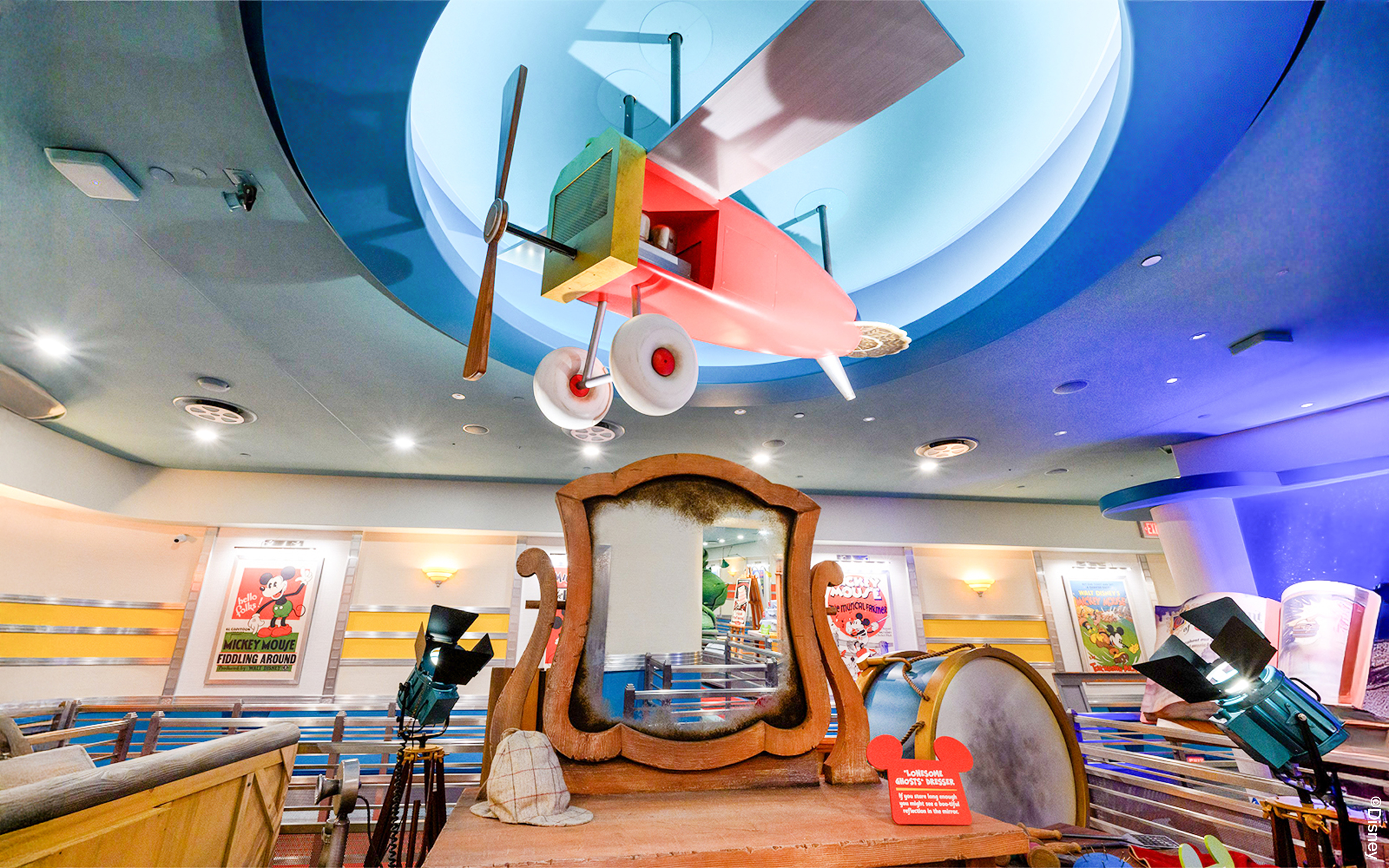 Colorful airplane model and vintage decor at Mickey's Toontown, Disneyland Park, California.