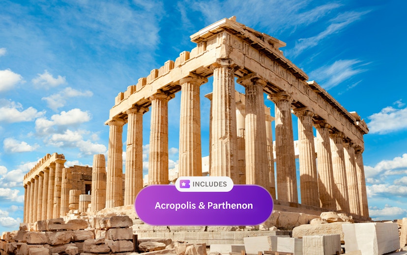 Parthenon temple on Acropolis hill under blue sky in Athens, Greece.