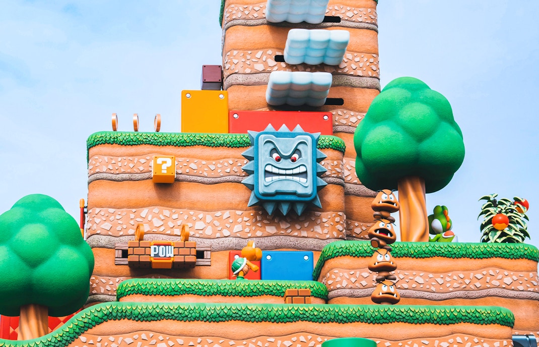 Super Nintendo World themed landscape with iconic game elements at Universal Studios.
