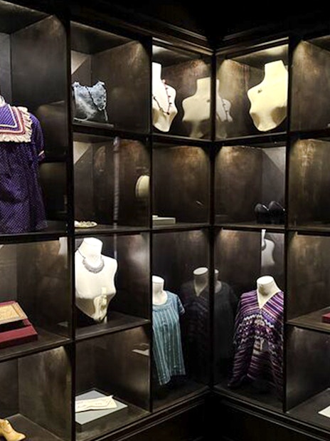 Frida Kahlo Museum display of traditional clothing and accessories in Mexico City.