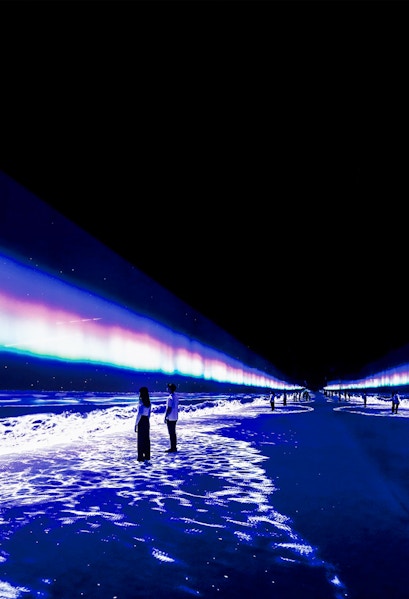 Visitors exploring immersive digital art installation at ARTE Museum, New York.