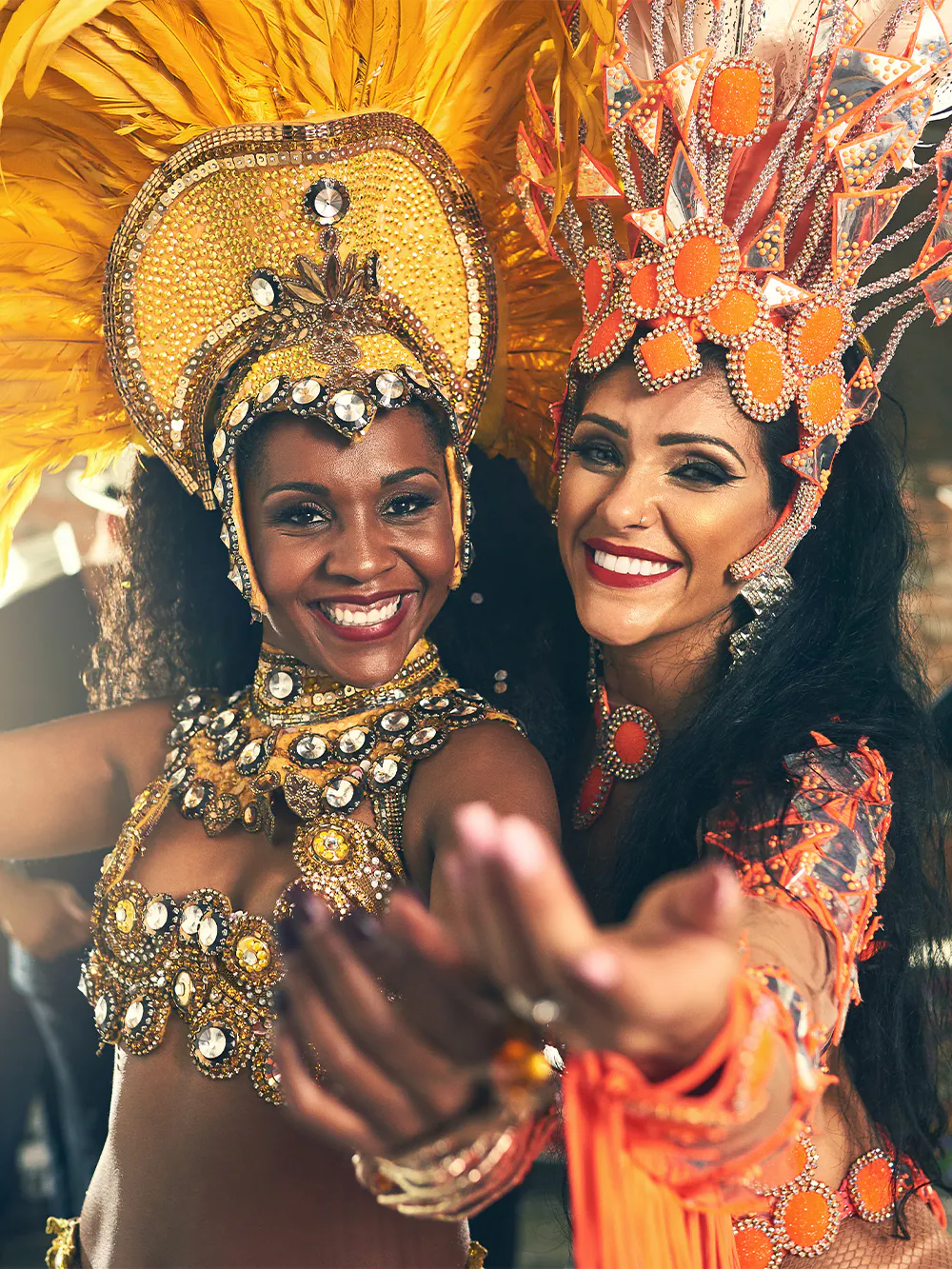 Carnival dancers in vibrant costumes at Rio de Janeiro festival.