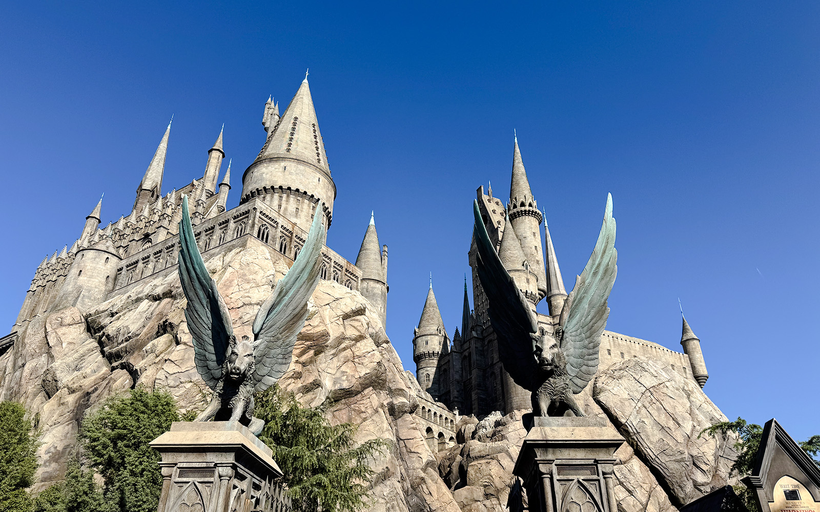 Hogwarts Castle at Universal Studios Hollywood with winged statues.