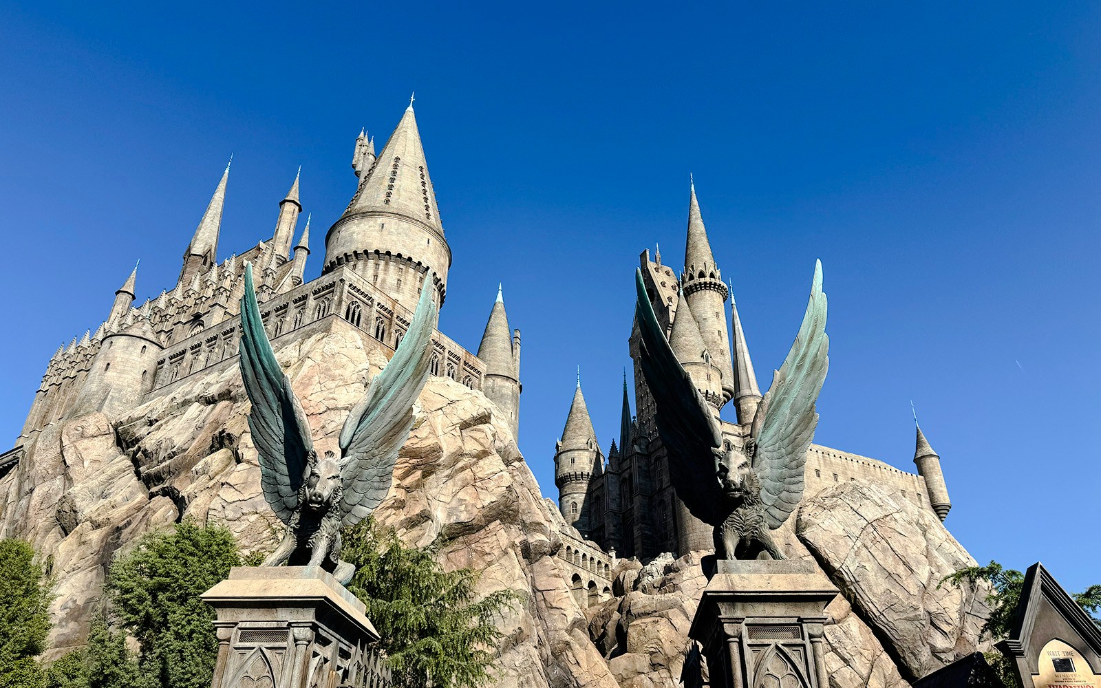Hogwarts Castle at Universal Studios Hollywood with winged statues.