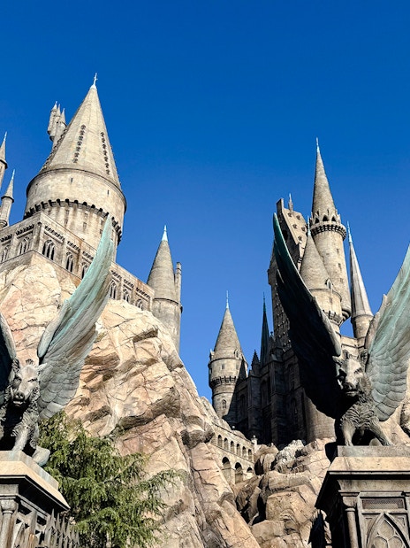 Hogwarts Castle at Universal Studios Hollywood with winged statues.
