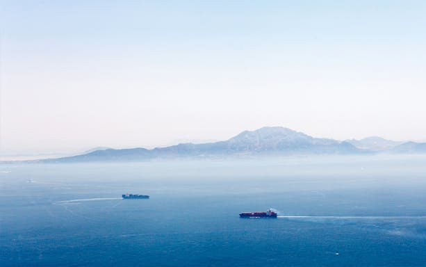 View of the Strait of Gibraltar with ships, seen during a day trip to Tangier from Málaga.