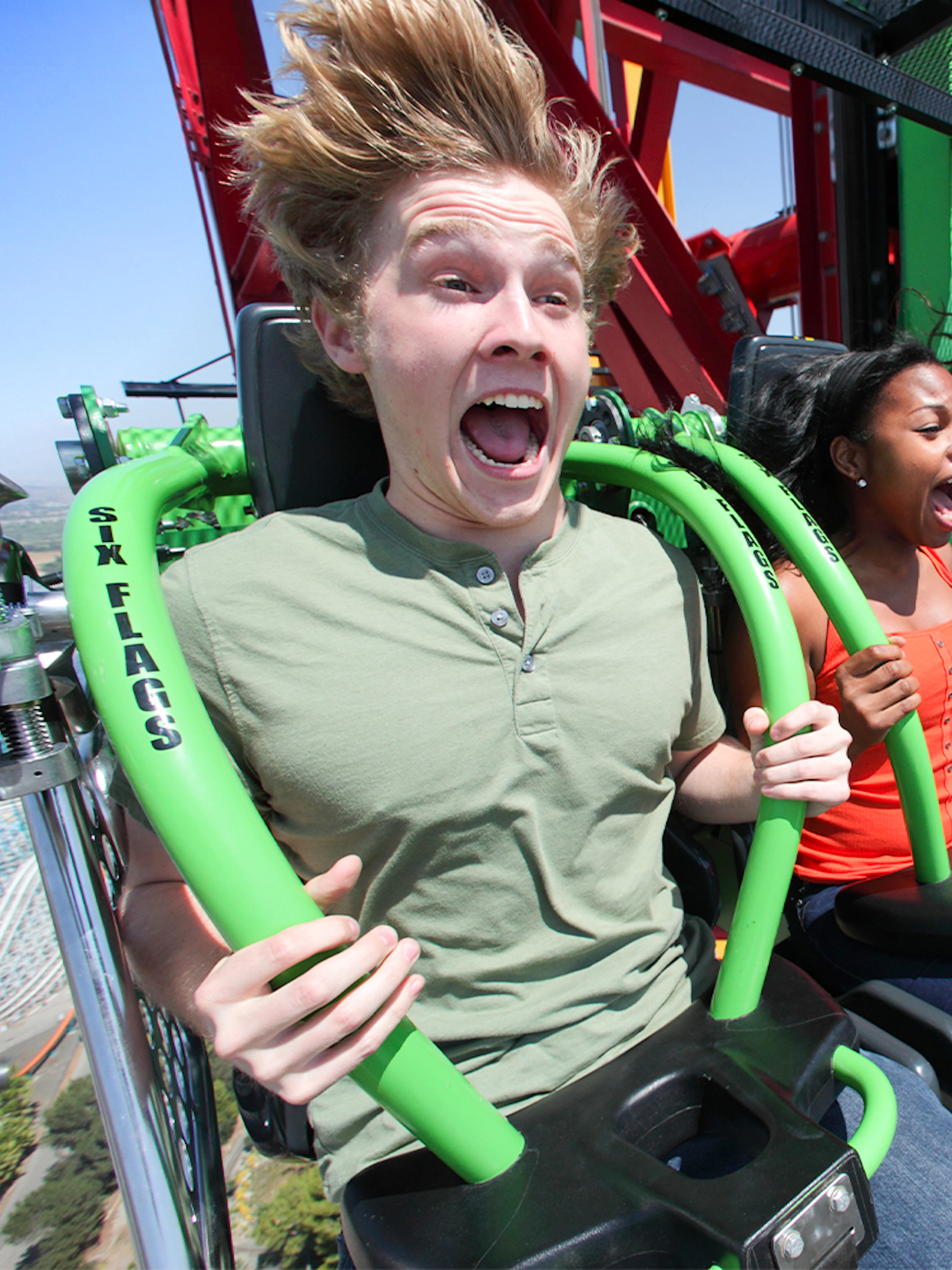 Riders experiencing the LEX LUTHOR™ Drop of Doom at Six Flags Magic Mountain.