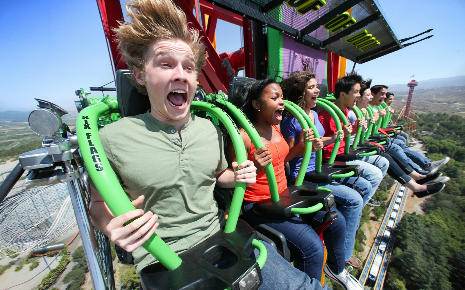 Riders experiencing the LEX LUTHOR™ Drop of Doom at Six Flags Magic Mountain.