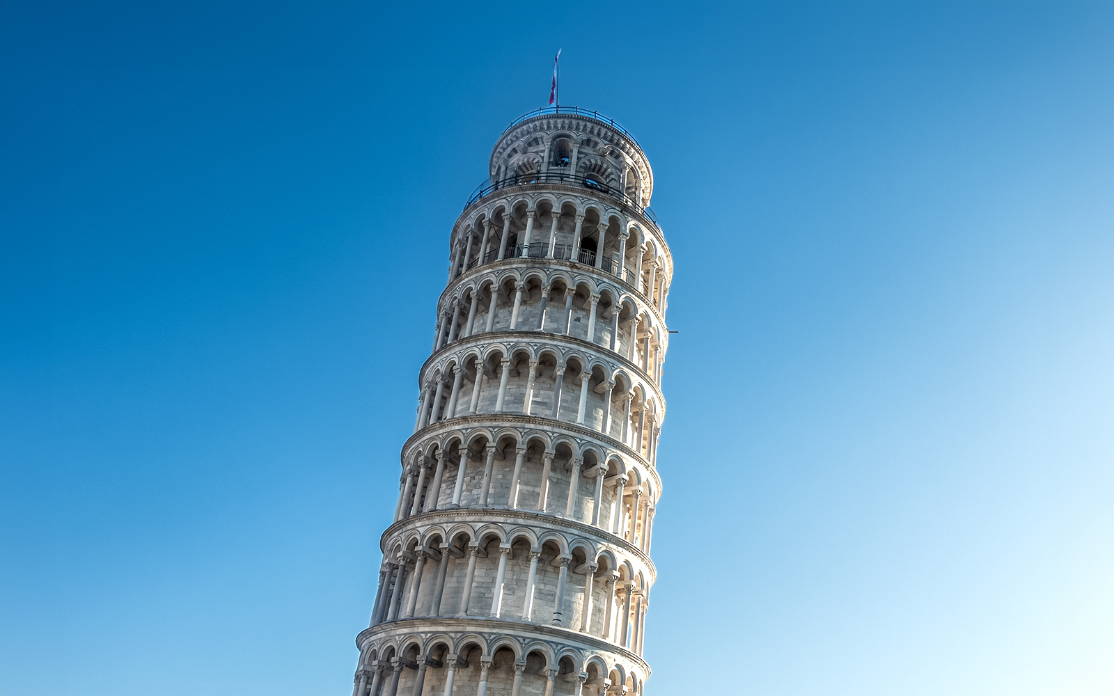 Early construction & first tilt (1173–1278)