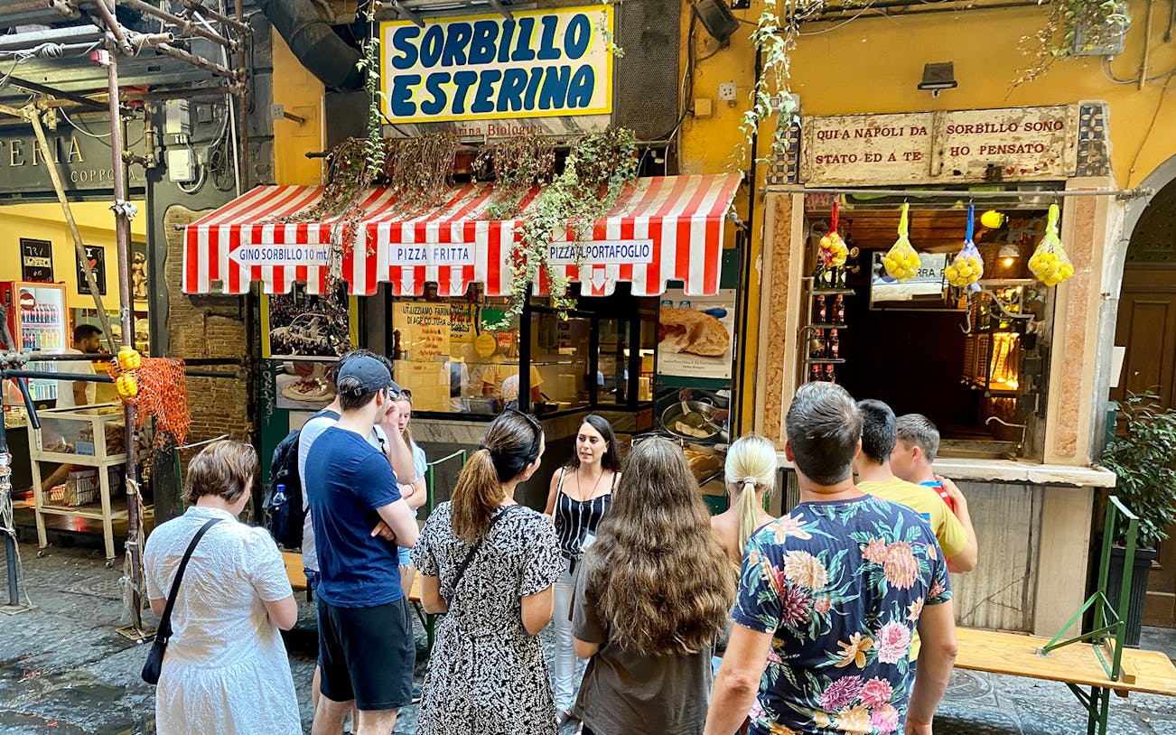 Tour group outside Sorbillo Esterina pizzeria in Naples, Italy.