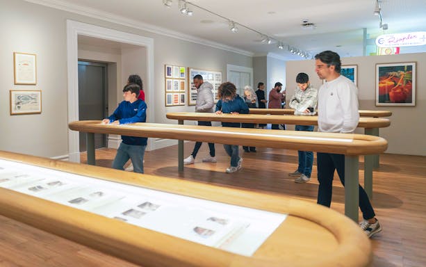 Visitors exploring exhibits at Porto Fashion and Fabric Museum.